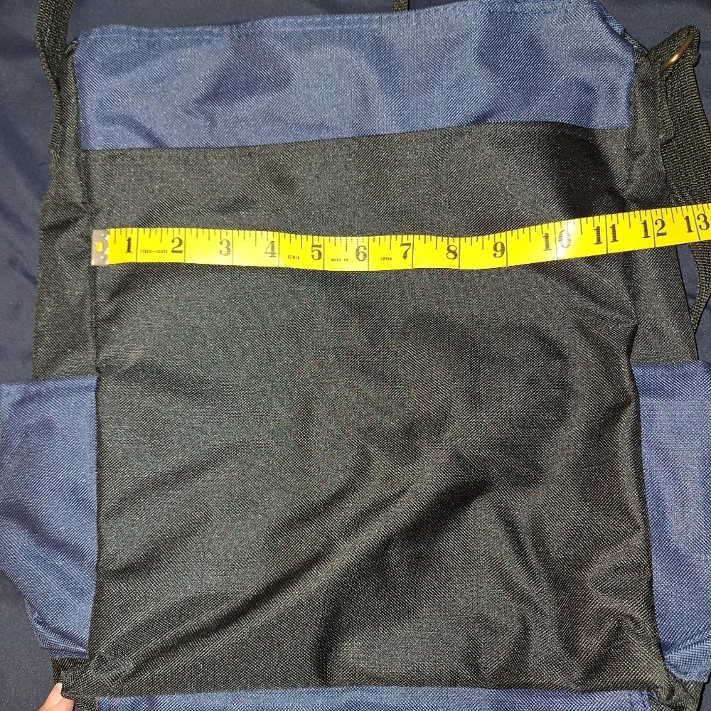 Stylish Blue and Black Men's Bag with Adjustable Strap and Side Bottle Holder